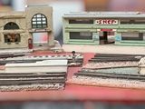 a small model of a building on a table
