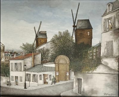 une peinture représentant un moulin à vent sur la façade d'un immeuble
