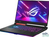 the asus rog laptop is a gaming laptop with a keyboard and mouse