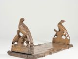 paire de serre-livres anciens en fonte représentant des oiseaux sur une branche