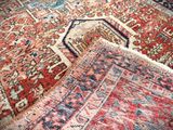 an image of a close up of a rug on a wooden floor