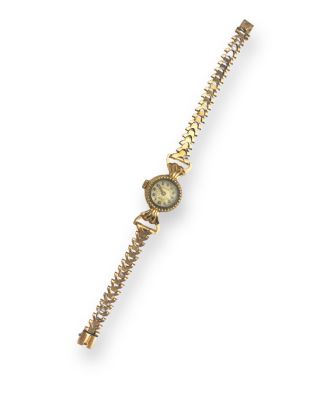 a close up of a wrist watch on a white background