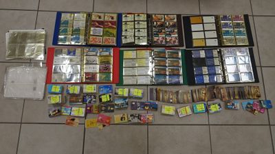 a lot of cards and a lot of other items on the floor
