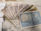 a pile of money sitting on top of a table
