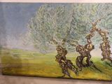 painting of a group of men riding horses in a field