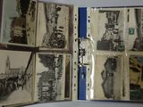 a binder with a bunch of old photos on it