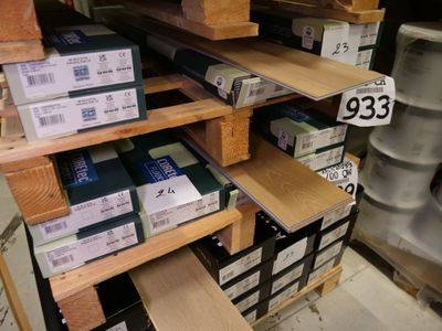 many boxes of books on the shelves in the store