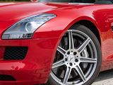 a red sports car parked on the side of the road