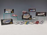 a lot of cars that are on display in a display case