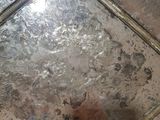 a dirty floor with a dirty tile on it