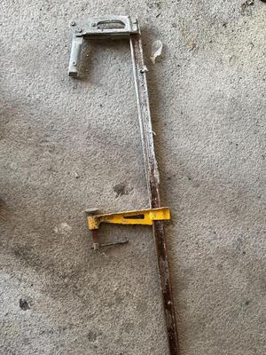 a picture of a pair of tools on a concrete floor