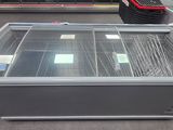 a glass display case in the middle of a store