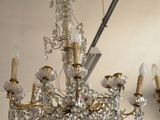 a chandelier hanging from the ceiling in a room