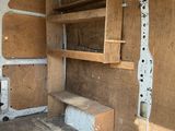 a picture of the inside of a van with the door open