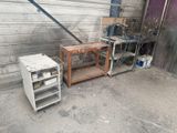 a small table and a small refrigerator in a garage