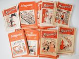 plusieurs magazines de styles et de formats variés posés sur une surface blanche