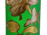 green vase with gold leaf and flower design on it