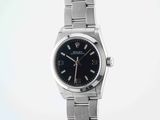 an image of a wrist watch with a black dial on a silver bracelet