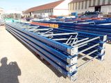 a large pile of steel beams in a warehouse