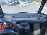 a view of a car ' s dashboard from inside the vehicle
