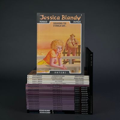books stacked on top of each other on a black surface