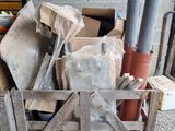 a wooden crate filled with assorted items in a garage