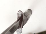 a close up of a pair of scissors on a table