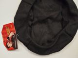 a black hat that is laying on a table