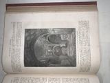 an open book with a picture of a building on it
