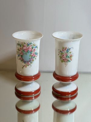 two cups sitting on top of each other on a table