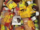a box full of food that is sitting on the floor