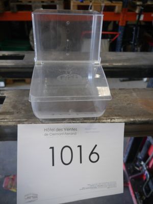 a plastic container with a number on it sitting on a table