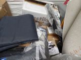 a pile of items that are sitting on the floor