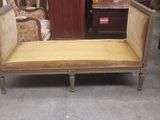 a couch that is sitting in the middle of a room