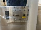 a close up of a metal panel with buttons on it