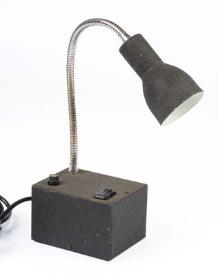 a lamp that is sitting on top of a block