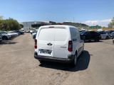 a white van that is parked in a parking lot