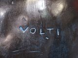 a close up of a metal object with the word volt written on it
