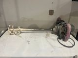 une photo d'un tuyau auquel est raccordé un flexible