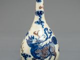 chinese blue and white gourd shaped bottle with a dragon on it