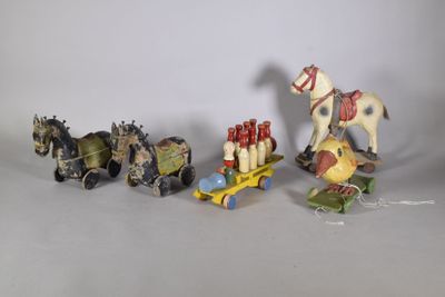 a group of toy animals that are sitting on a table