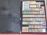 a book with stamps on it sitting on a table