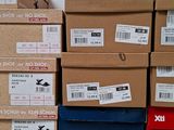 several boxes stacked on top of each other on a table