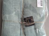 a bag of blue linen wrapped in a package