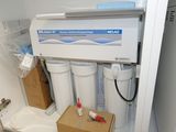an image of a water filtrator in a small room