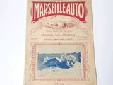 un vieux magazine français avec la photo d'une femme dans une voiture