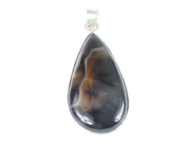 a close up of a tear shaped pendant on a white background
