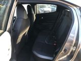 the back seat of a car with a seat belt in it