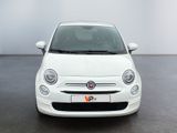 the front view of a white fiat car parked in a parking lot