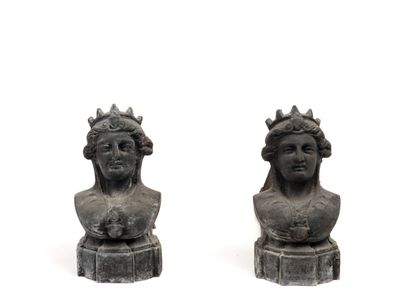 pair of cast iron busturines of a woman and a man